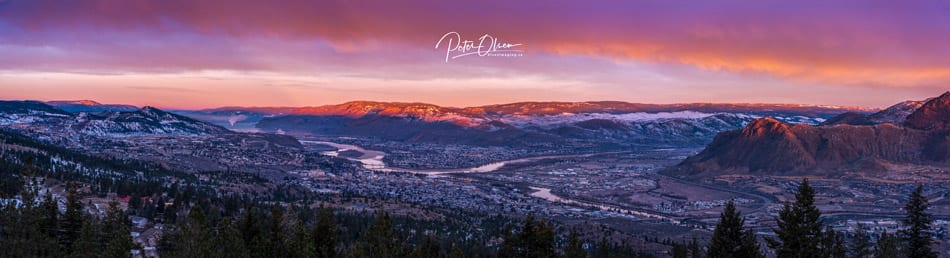 Kamloops City panoramic view purple pink and blue sky with rivers and mountains with trees