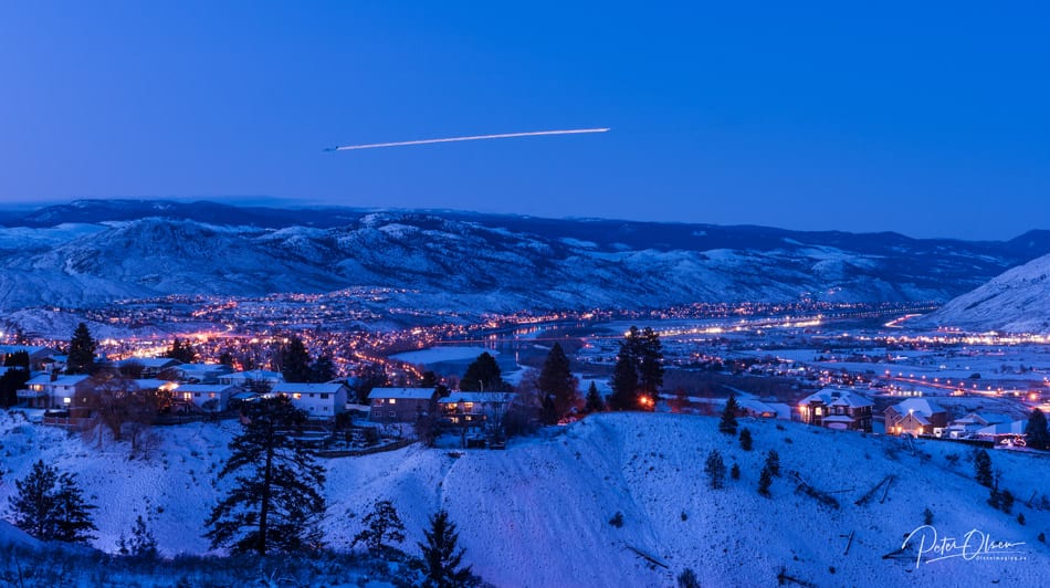 Kamloops City blue sky with airplane and city with lights