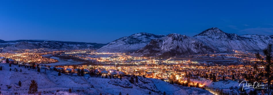 Kamloops City blue sky with mountain snow with city lights and blue sky