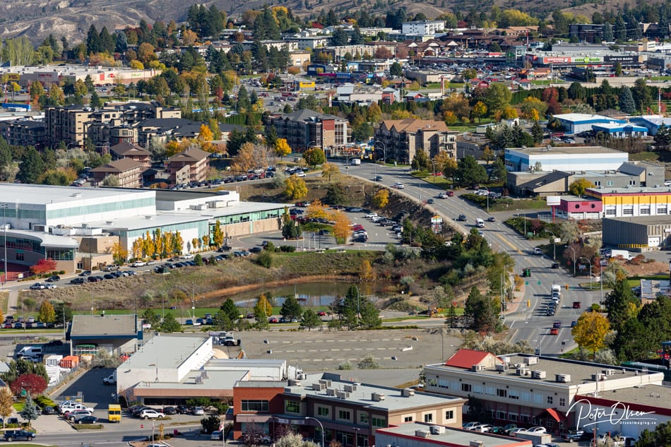 Kamloops City view with buildings and cars with colorful trees