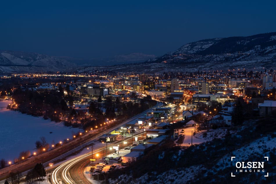 night view with snow-capped mountains with roads