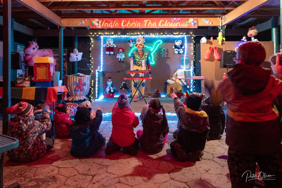 Children enjoying a show from Uncle Chris the clown