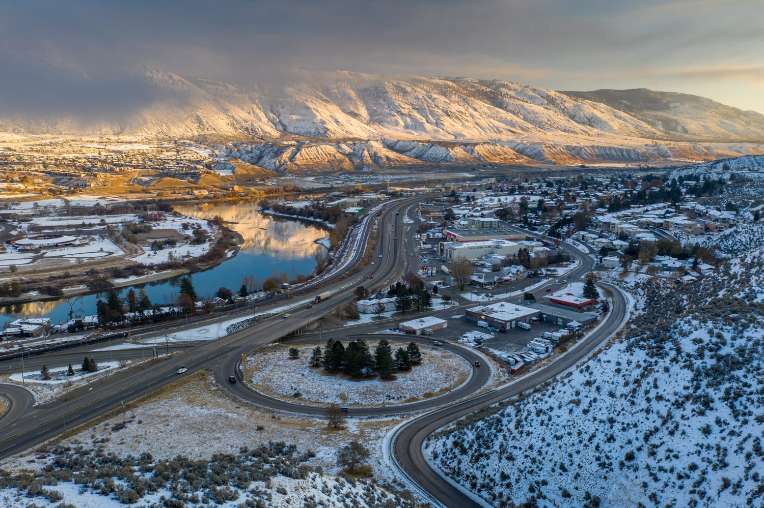 Kamloops City Aerial traffic circle with snow and mountain