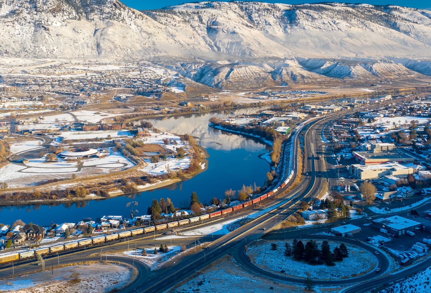 Kamloops City Aerial traffic circle with snow and mountains
