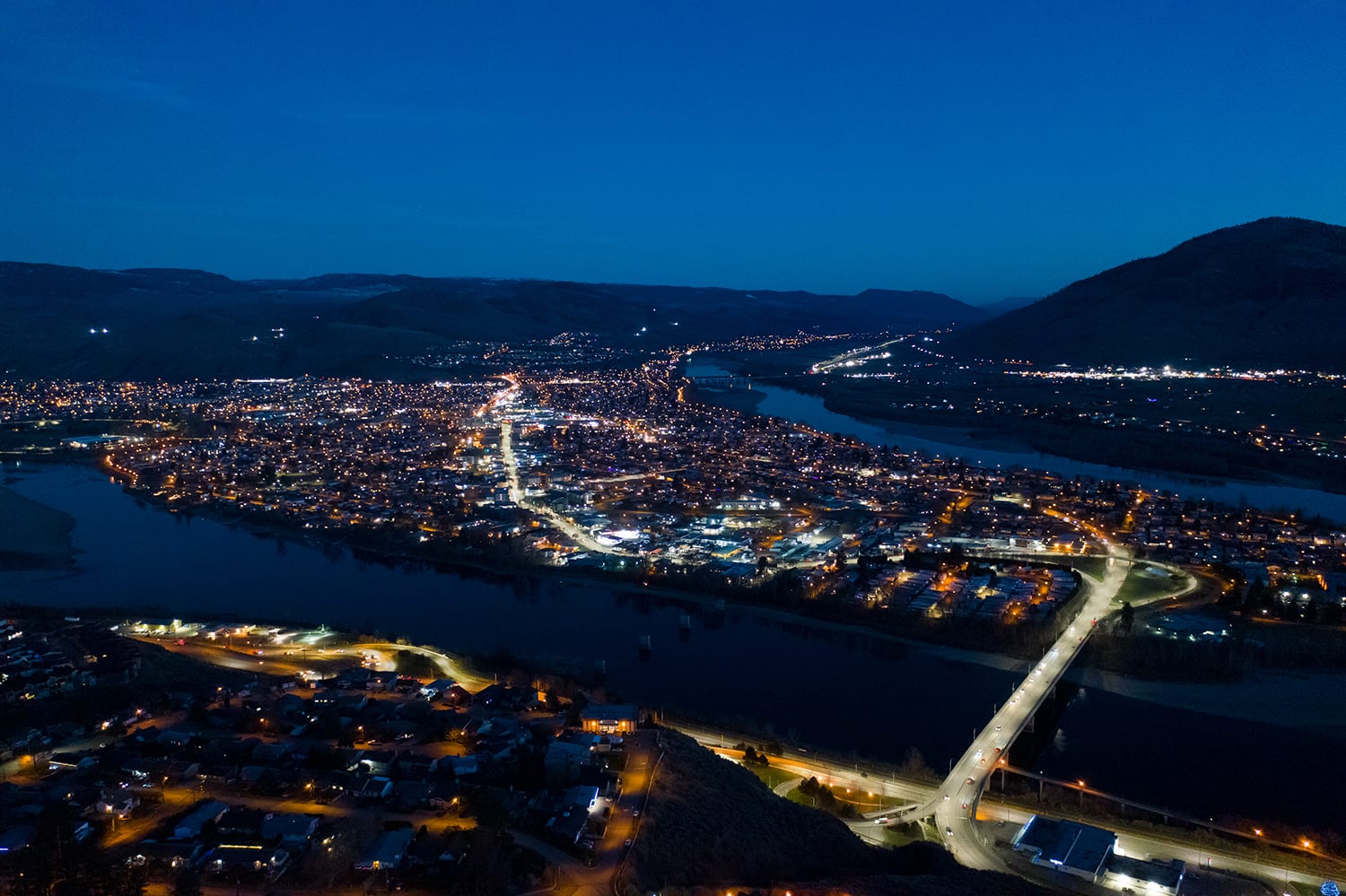 Kamloops City Aerial bright night photography with roads early evening