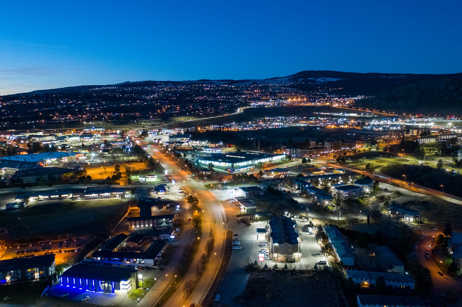 Kamloops City Aerial neon lights and roads at night