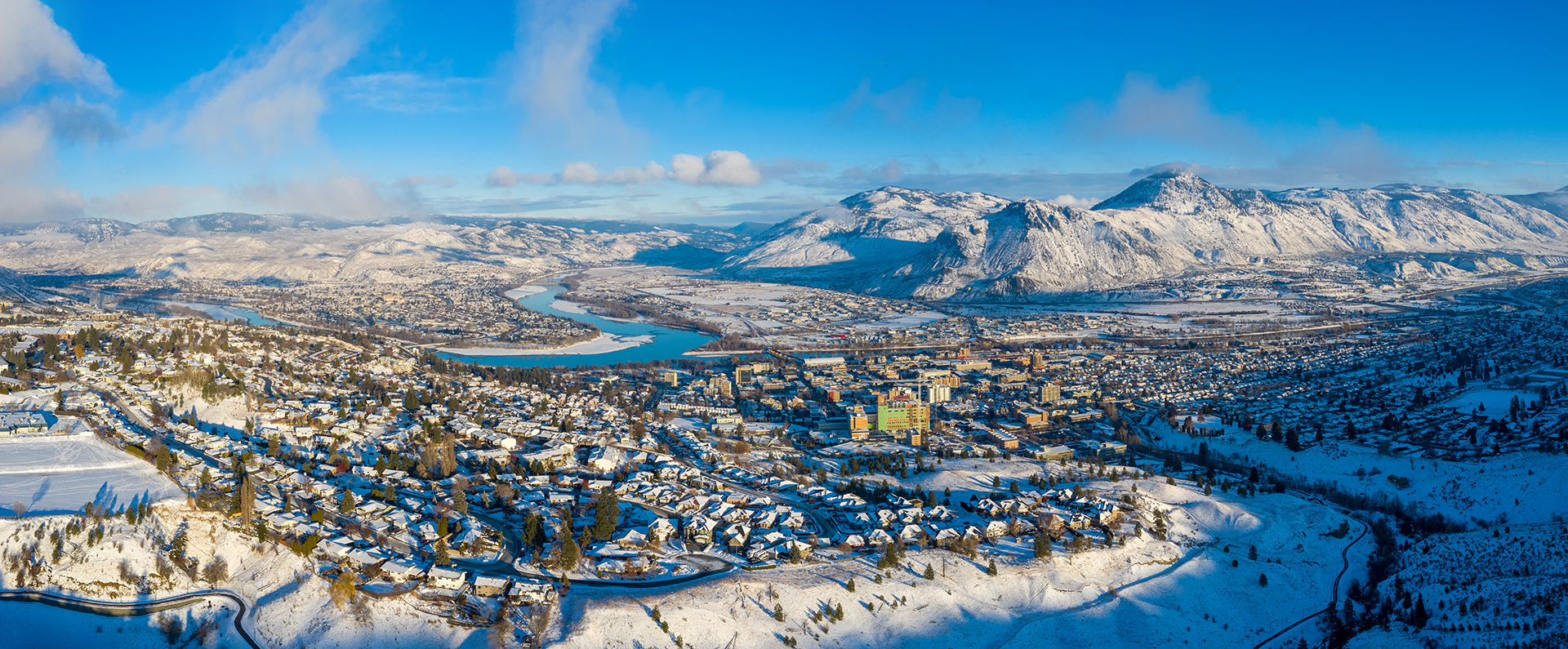 Kamloops City Aerial view with snow and mountains daytime