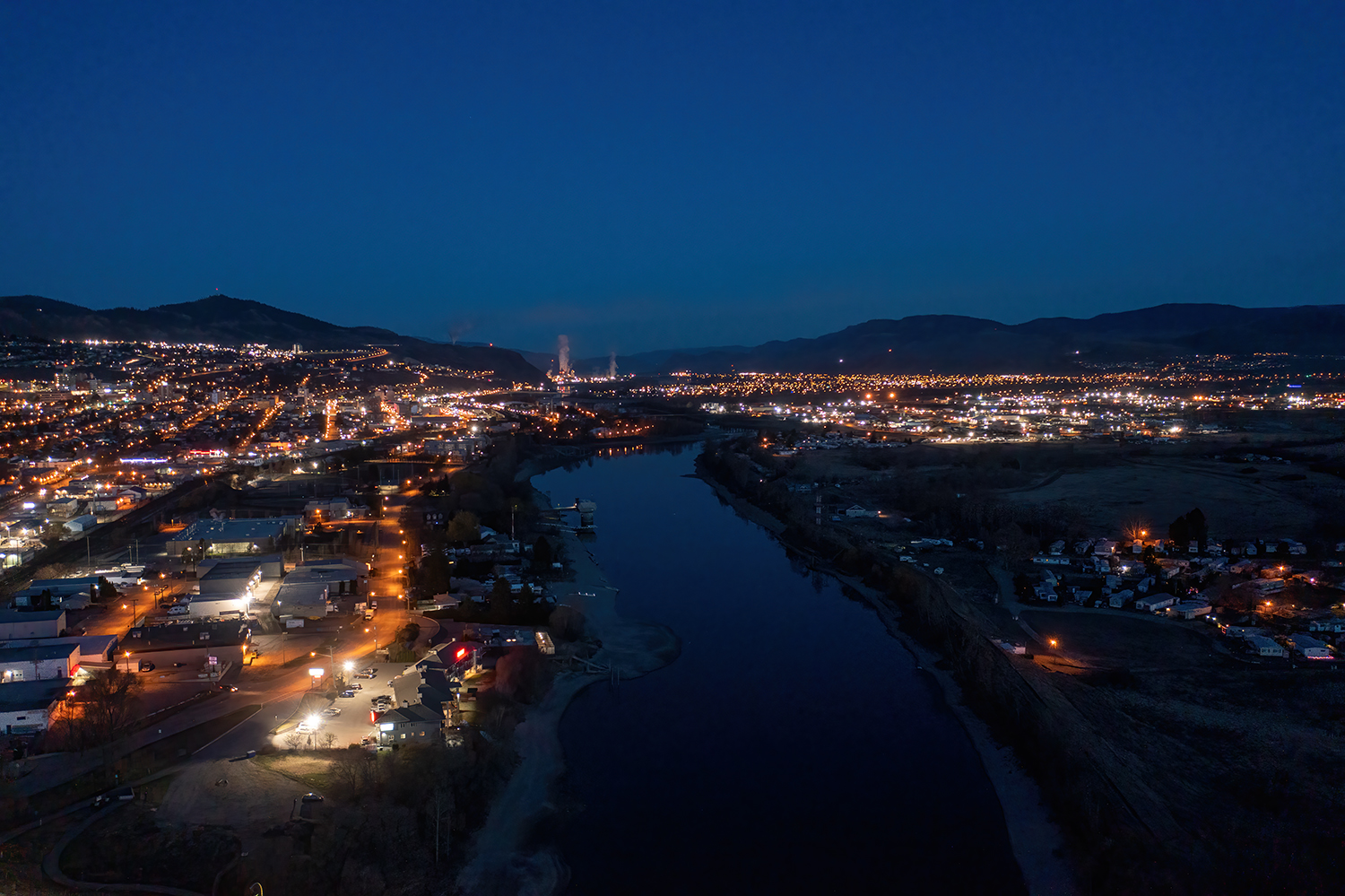 Kamloops City Aerial nighttime view with lights and road enhanced