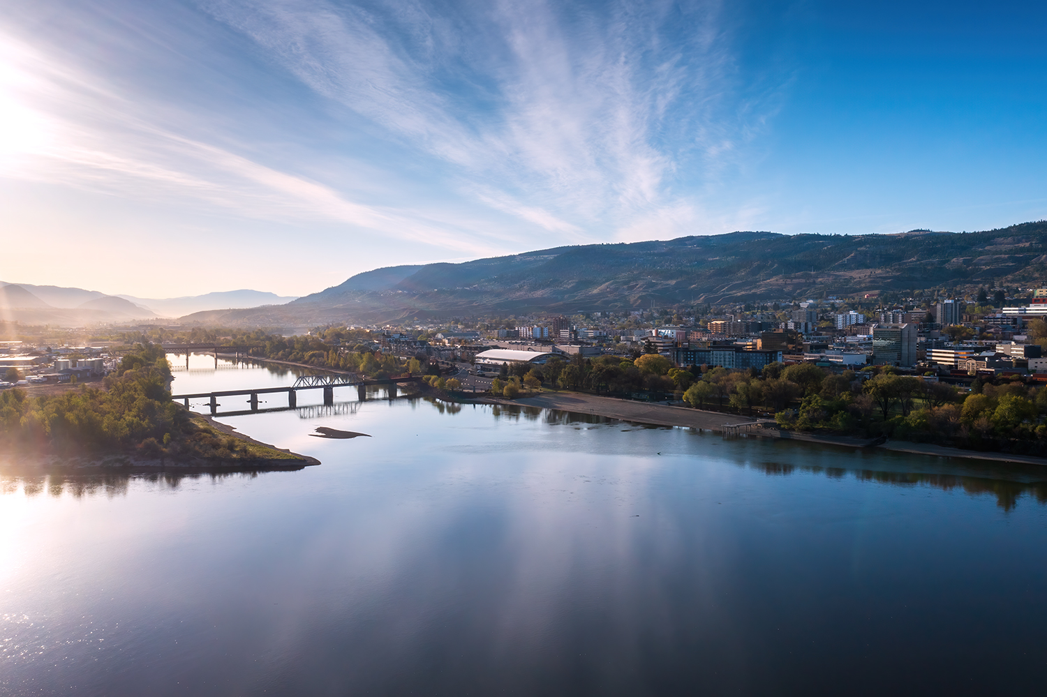 Kamloops City Aerial view of river with bridge and city with greenery