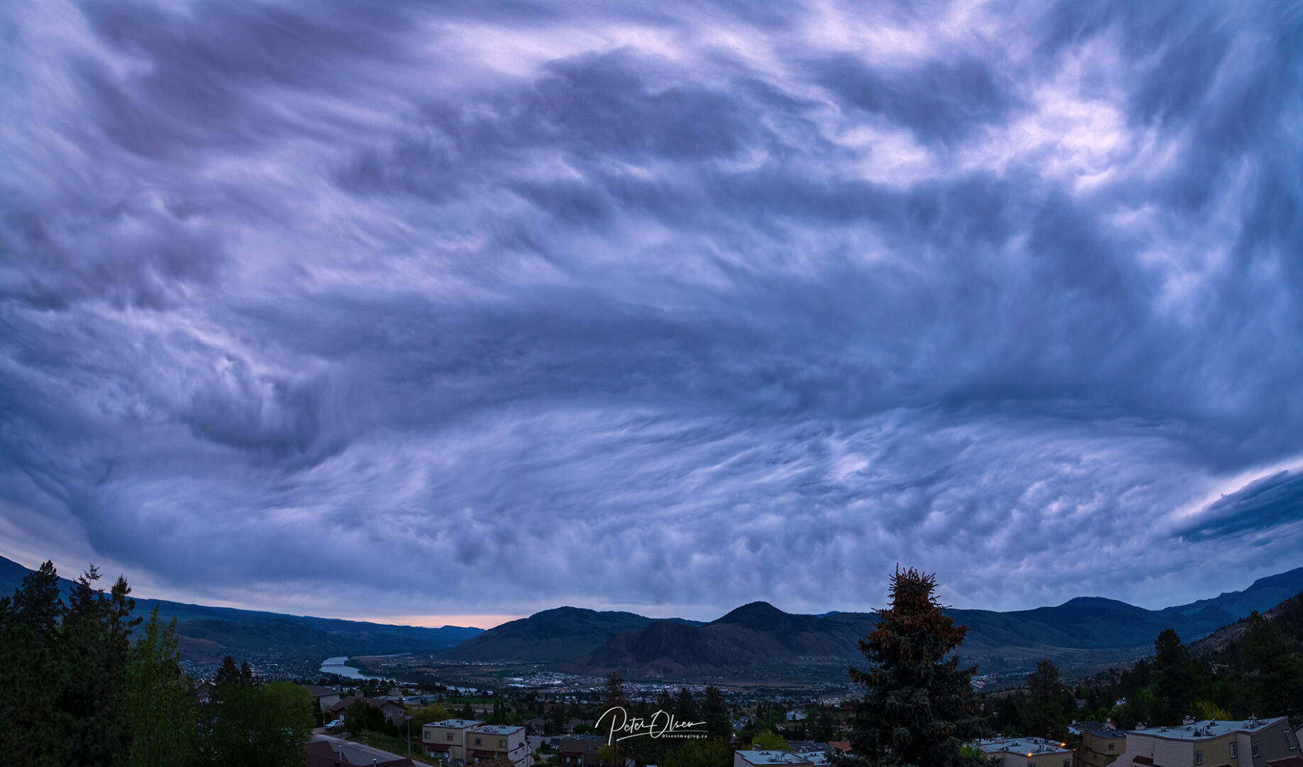 Kamloops City sky covered with clouds and mountain with city