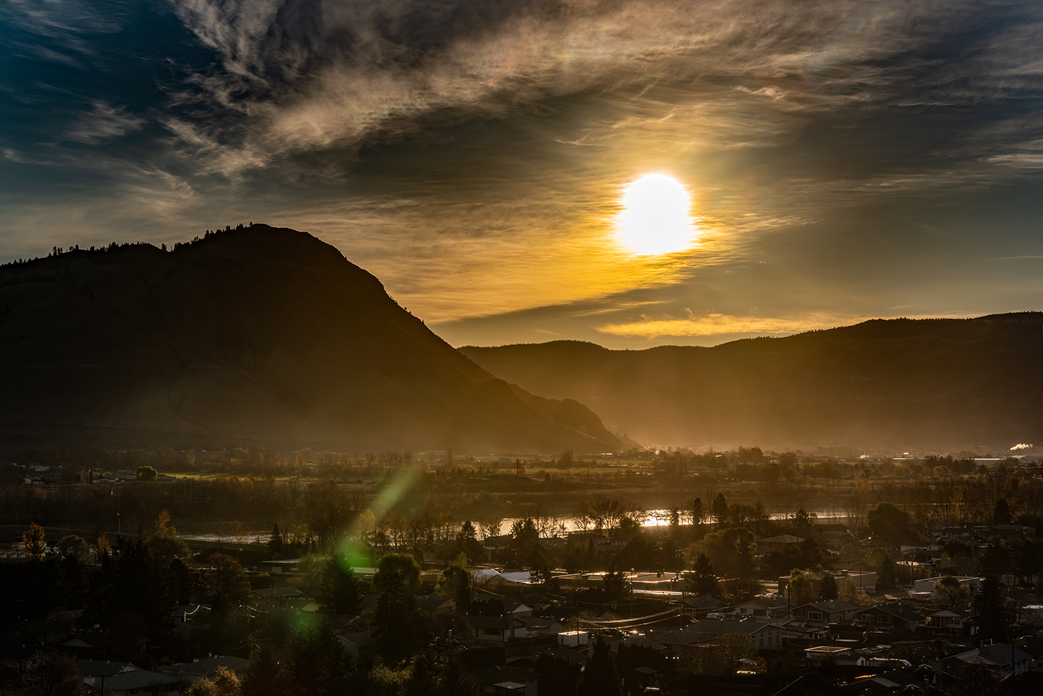sunrise panoramic view of mountains and city