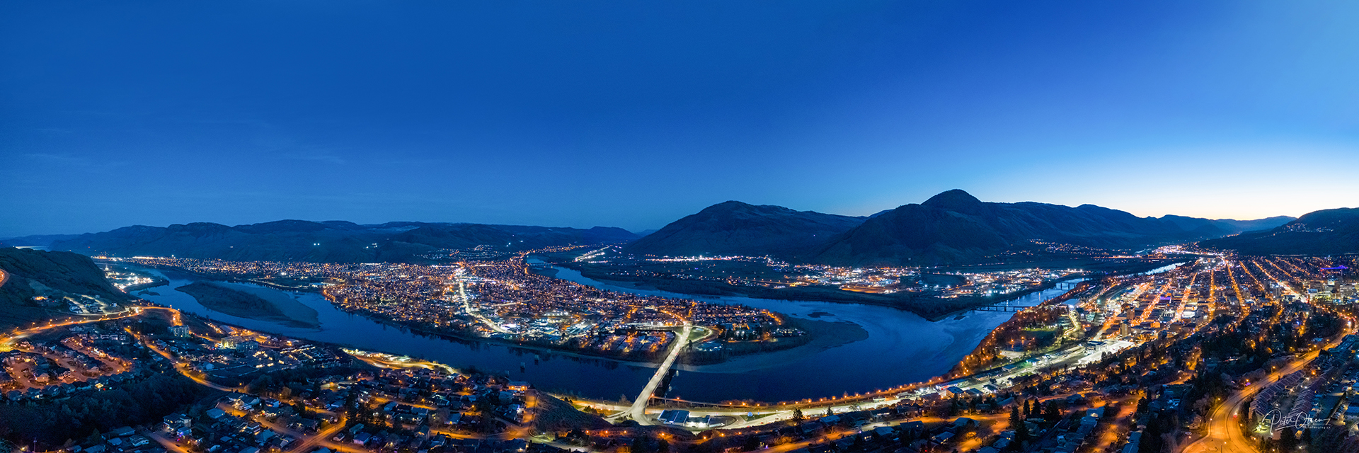 Kamloops City Aerial bright blue sky with city lights