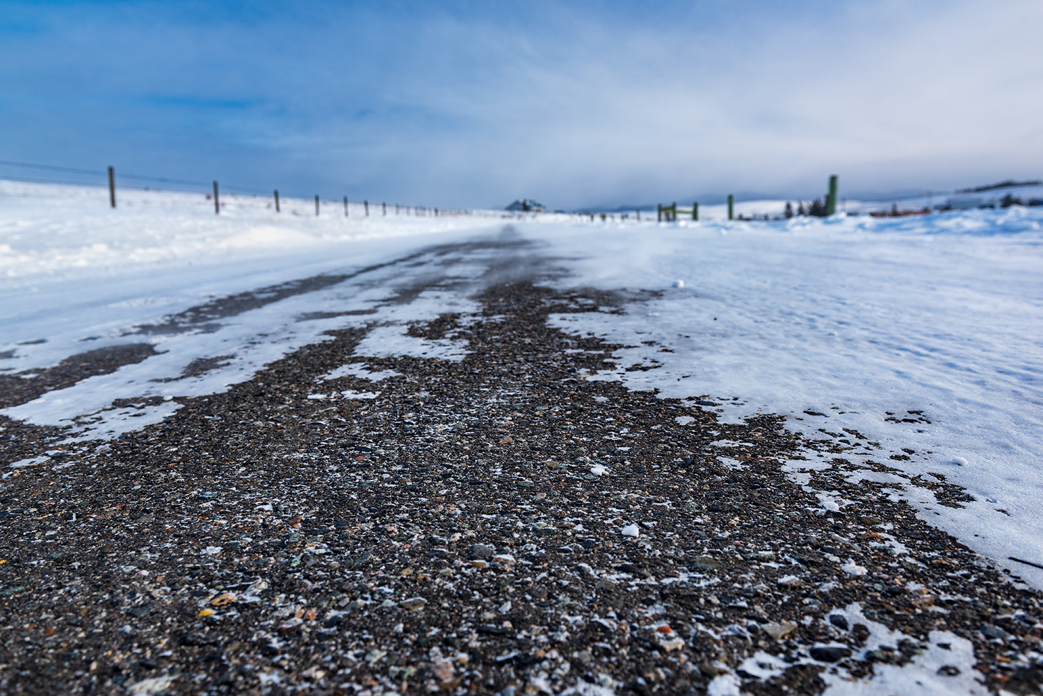 Kamloops Landscape with gravel road and sky with snow
