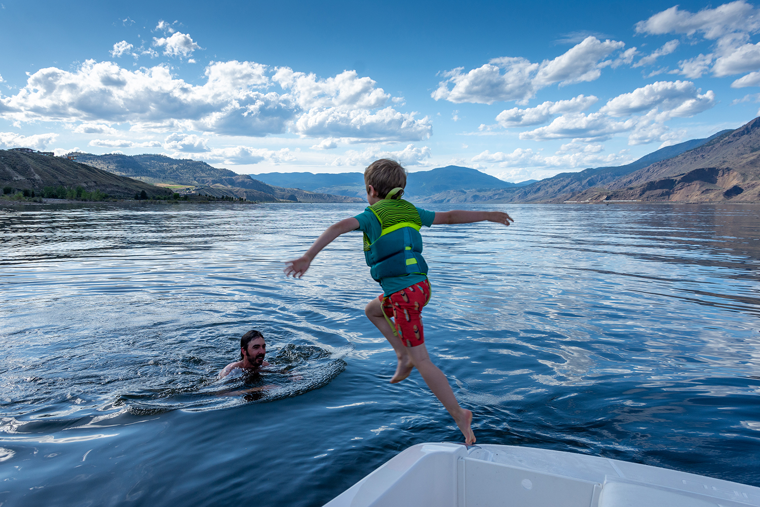 Kamloops Other child jumping out of boat into the water