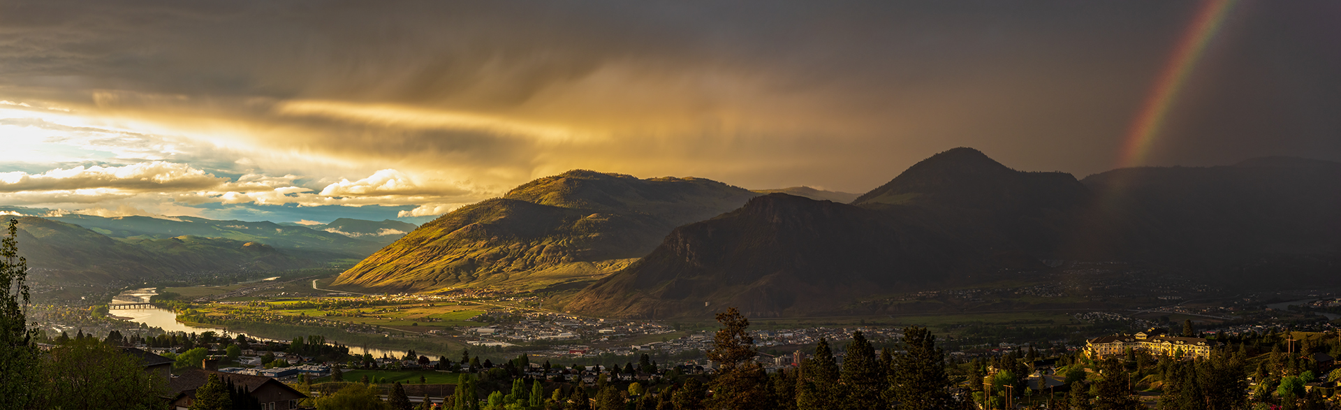 Kamloops Landscape faraway view of country landscape with mountain and rainbow