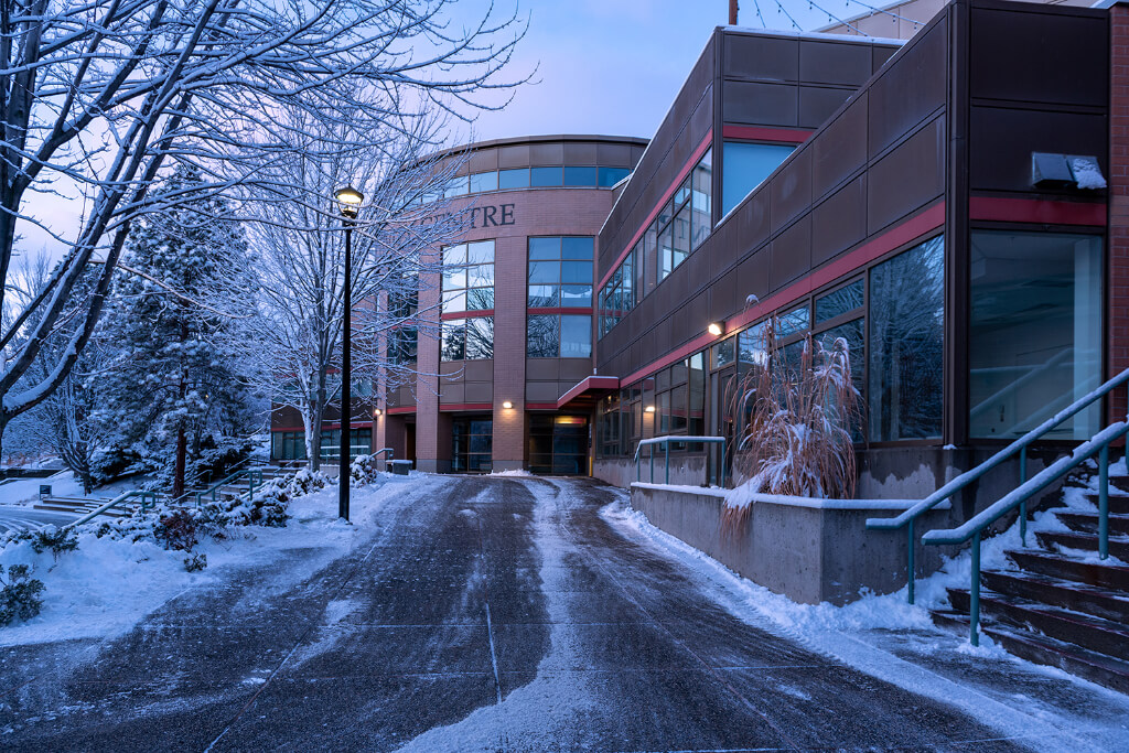 A path to campus activity center building covered with snow