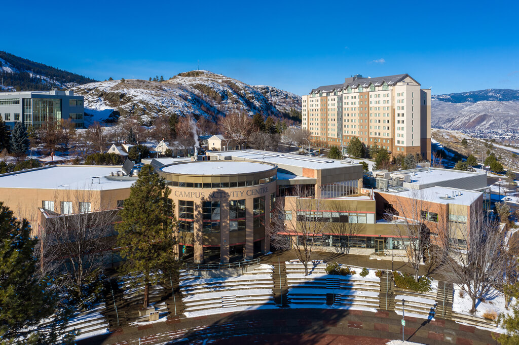 Top view of campus activity Center along with mountains
